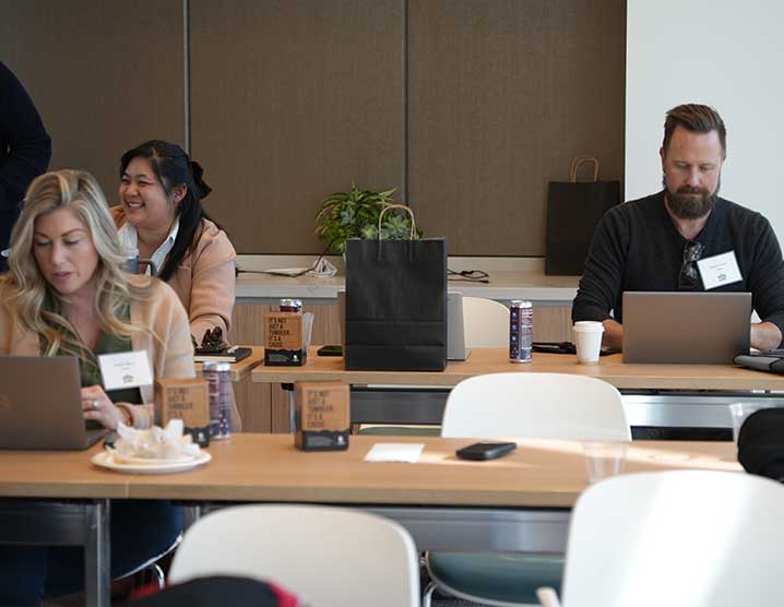 Various people working in a conference room